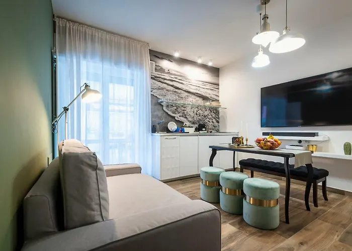 Апартаменты Alga 5-star Boutique Steps From The Sea Мартинсикуро